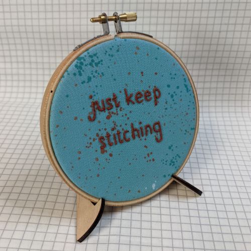 Just keep stitching quote hoop in hoop stand
