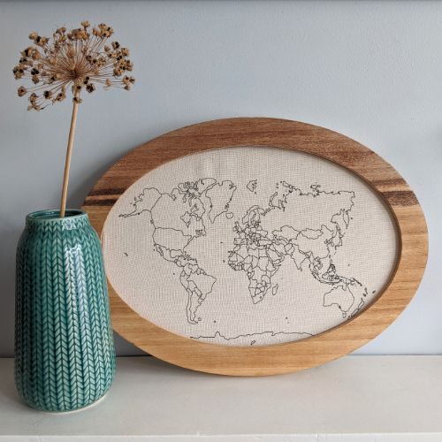 world map with an oakley furniture board frame