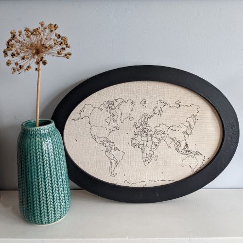 world map with a black painted MDF frame